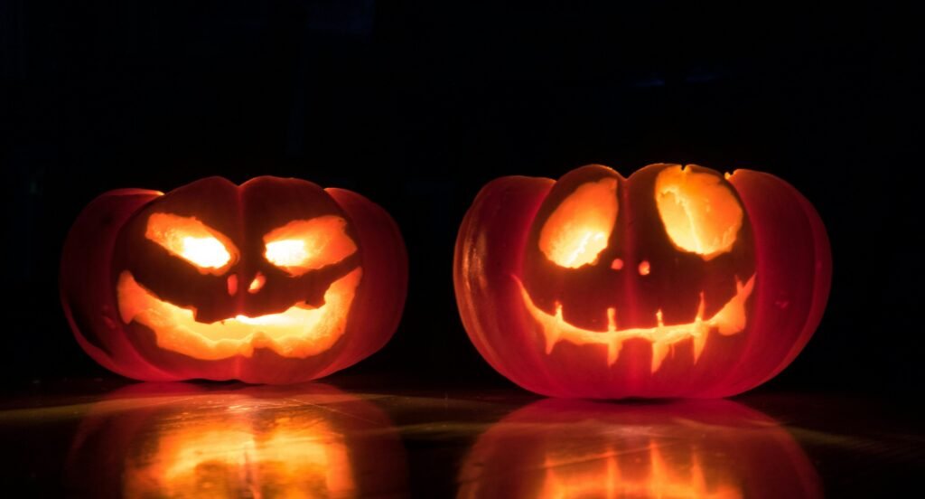 Two glowing jack-o’-lantern pumpkins for Halloween in Barcelona